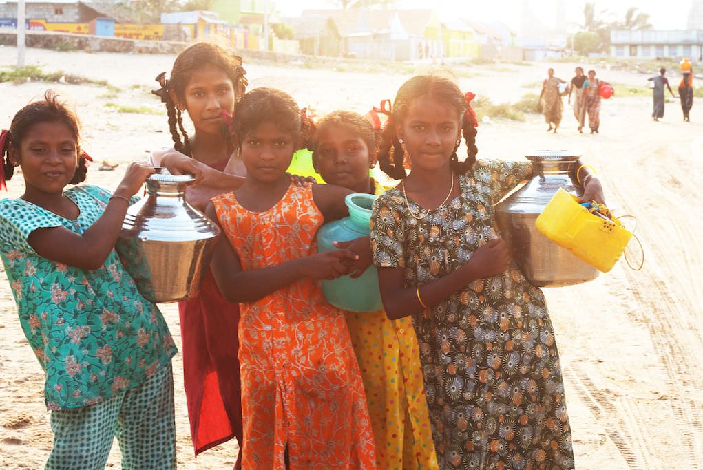 These courageous women carry water from the well to their homes every morning and afternoon...